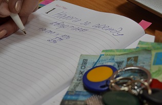 notepad, money and pen